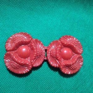 Vintage red plastic flower belt buckle